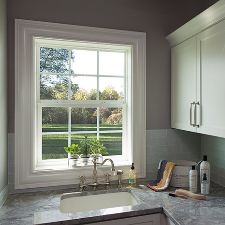 New Window Installation in Boerne, TX home bathroom with sink and white cabinets